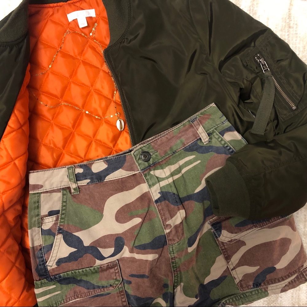 Khaki bomber jacket with orange quilted lining